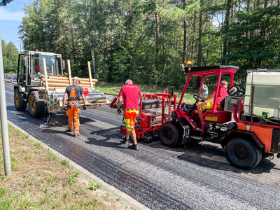 Einbau der Asphaltbewehrung in Celle